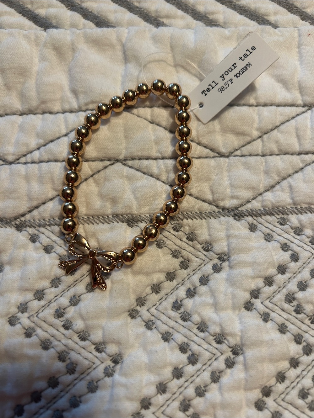 NEW  tell your tale Beaded Bracelet with Bow Charm